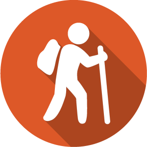 An icon of a hiker, white on an orange circle