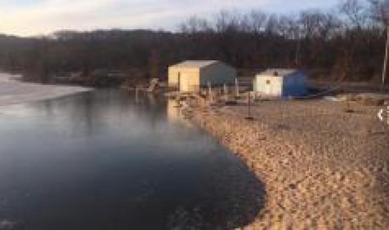 The flooded beach front of YMCA Camp Kitaki in 2019