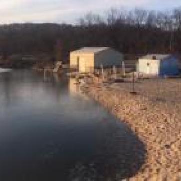The flooded beach front of YMCA Camp Kitaki in 2019